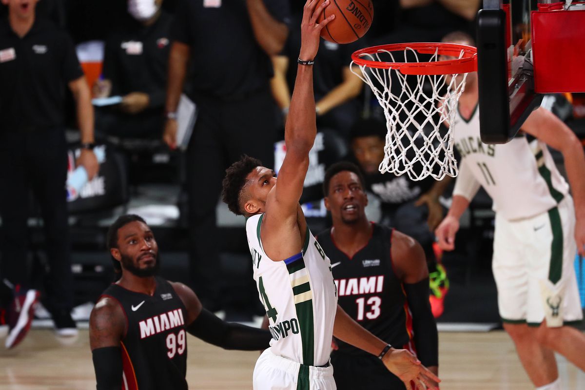 Giannis Antetokounmpo of the Milwaukee Bucks dunks against the Miami Heat during the second half at The Arena at ESPN Wide World Of Sports Complex on August 6, 2020 in Lake Buena Vista, Florida.