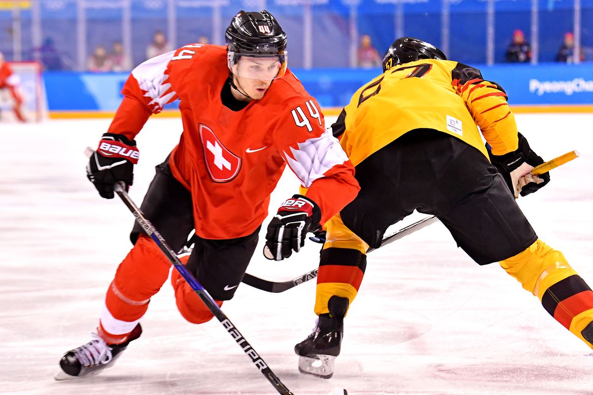 Olympics: Ice Hockey-Men Team Qualification Match for Quarterfinal - SUI-GER
