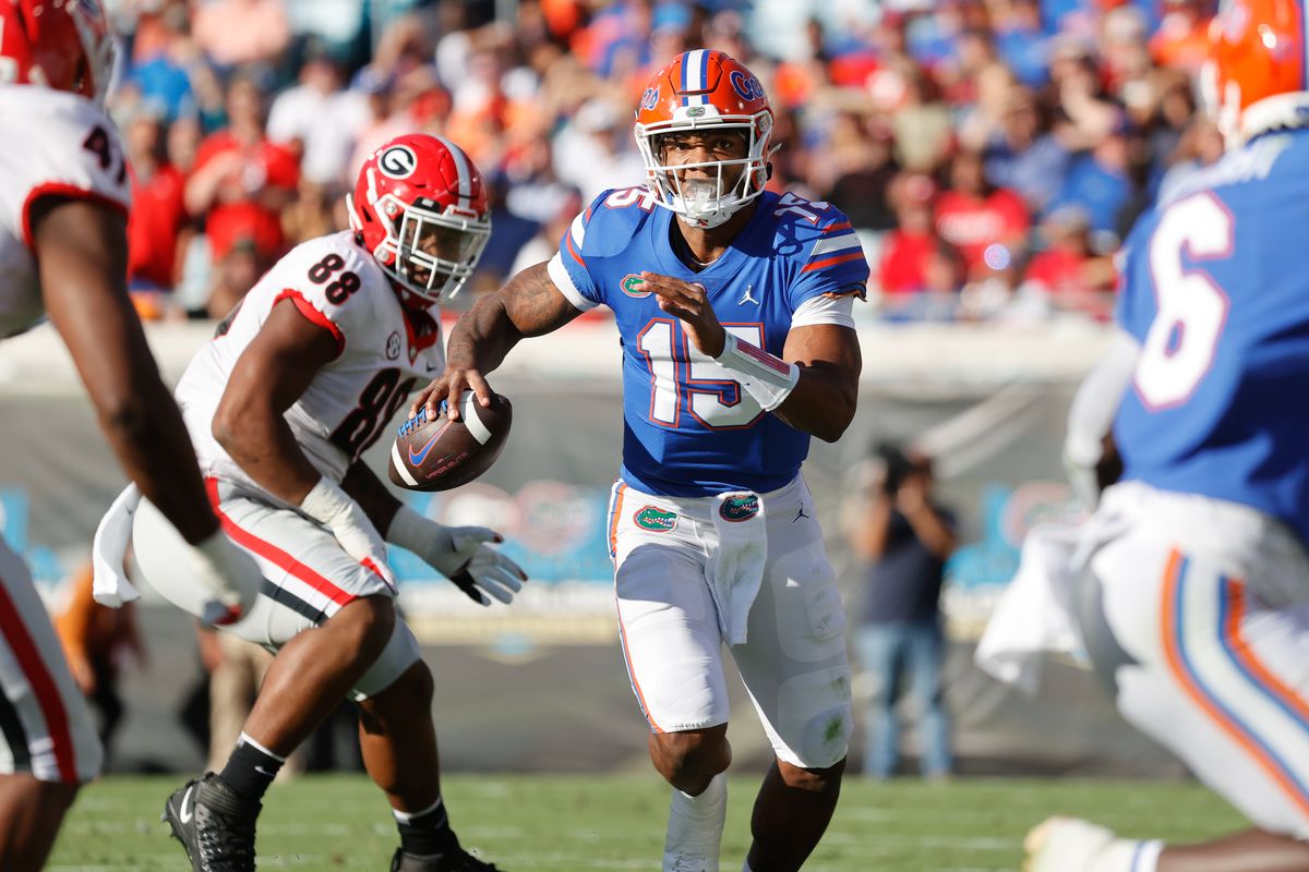 Florida Gators quarterback Anthony Richardson runs out of the pocket against the Georgia Bulldogs during the first half at TIAA Bank Field.