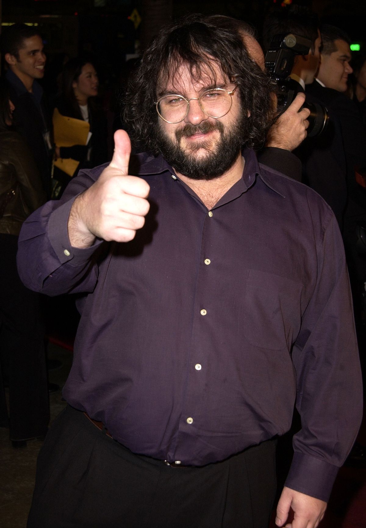 Peter Jackson gives a thumbs-up on the red carpet at the Los Angeles premiere of The Lord of the Rings: The Fellowship of the Ring