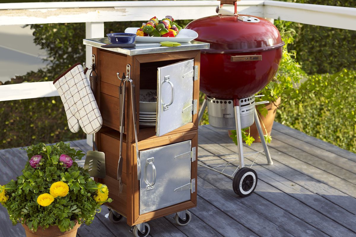 A grill staton made of garden planters.