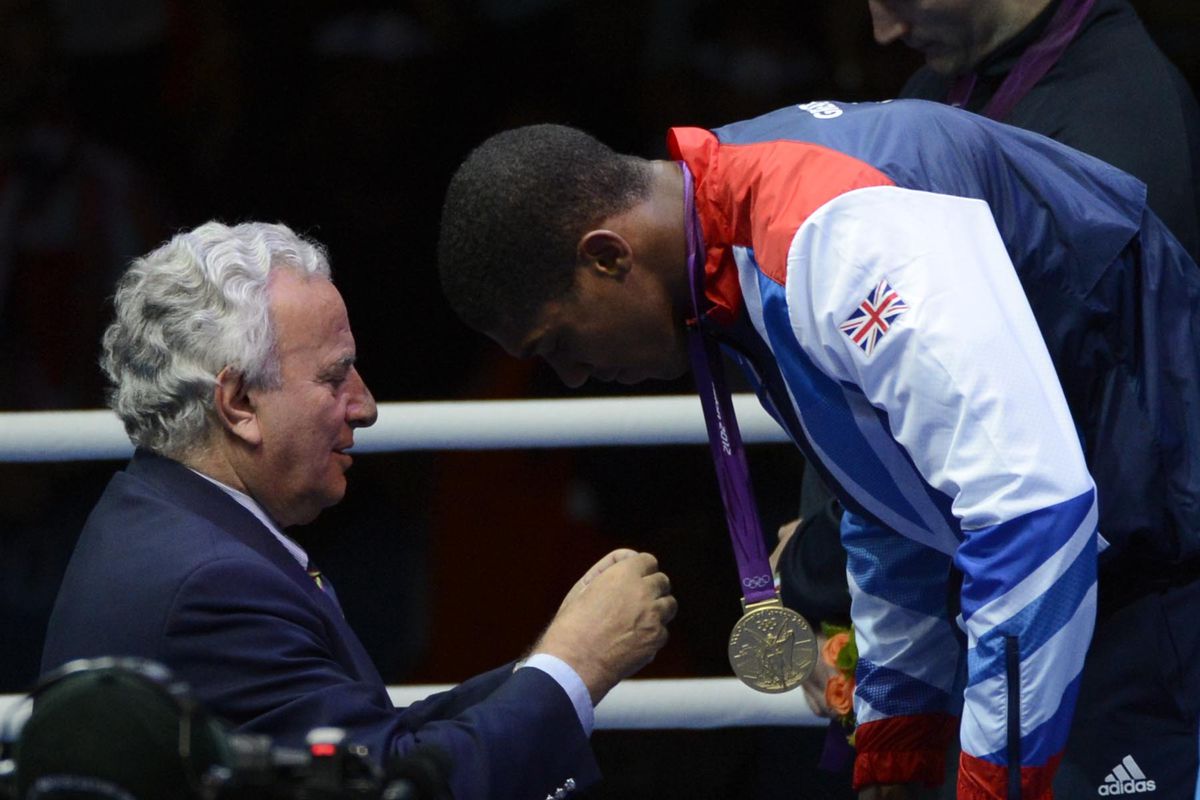 Aug 12, 2012; London, United Kingdom; Anthony Joshua (GBR) receives his medal after winning the men's super heavy weight final bout during the London 2012 Olympic Games at ExCeL - South Arena 2.