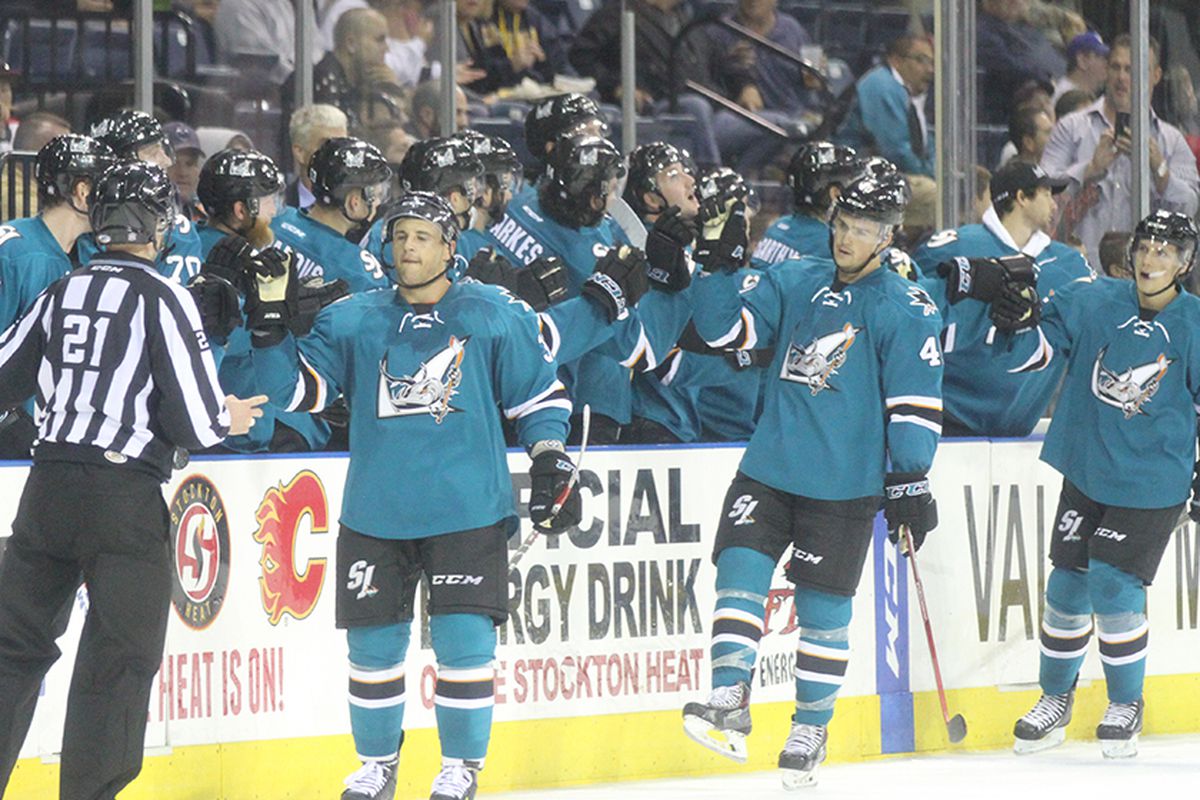 San Jose Barracuda forward Micheal Haley fist bumps with the Barracuda bench after scoring a second period goal in the Barracuda's 4-1 win over the Stockton Heat at Stockton Arena. (SJBarracuda.com)