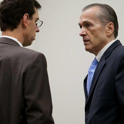 Martin MacNeill speaks to his attorney Randy Spencer, left, before proceedings in Provo's 4th District Court on Tuesday, Nov. 5, 2013. MacNeill is charged with murder in the 2007 death of his wife, Michele MacNeill.
