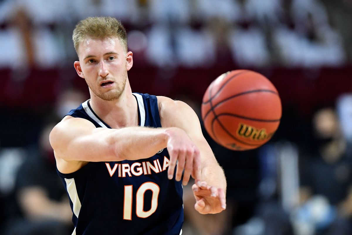 Virginia Cavaliers forward Sam Hauser makes a pass during the second half of a game against the Boston College Eagles at Conte Forum.