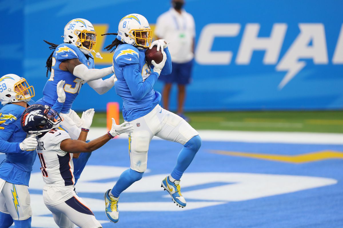 Mike Williams #81 of the Los Angeles Chargers intercepts the ball to end the game against the Denver Broncos at SoFi Stadium on December 27, 2020 in Inglewood, California.