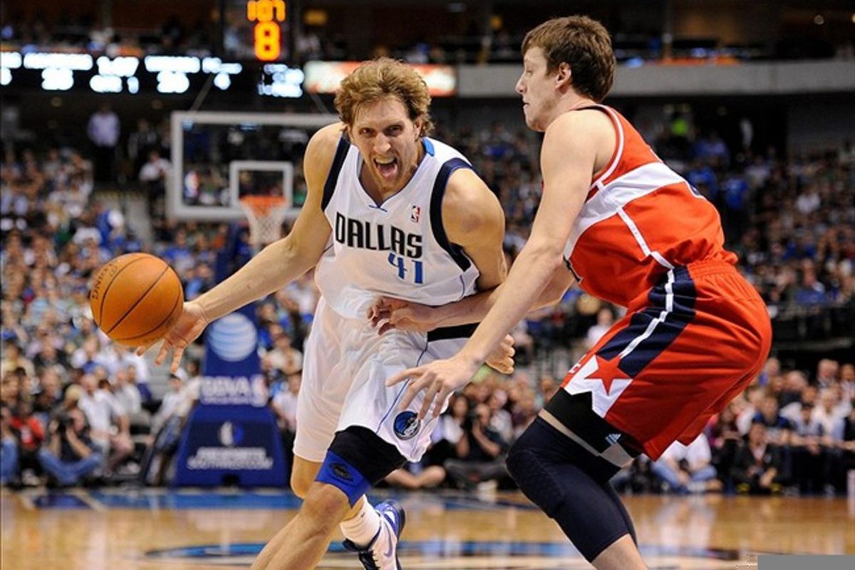 Mar 13, 2012; Dallas, TX, USA; Dallas Mavericks power forward Dirk Nowitzki (41) drives the ball past Washington Wizards forward Jan Vesely (24) during the second quarter at the American Airlines Center. Mandatory Credit: Jerome Miron-US PRESSWIRE