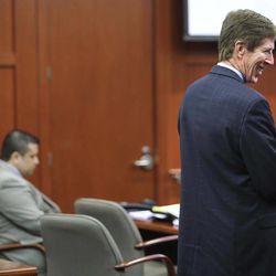 Defense attorney Mark O'Mara, right, listens to Assistant State Attorney Bernie de la Rionda during the pre-trial hearing for George Zimmerman, left, in Seminole circuit court in Sanford, Fla., Saturday, June 8, 2013. 