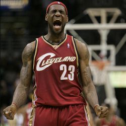 In this March 10, 2007 file photo, Cleveland Cavaliers forward LeBron James reacts to a shot made by teammate Anderson Varejao  during the final seconds of the fourth quarter of an NBA basketball game, in Milwaukee. The three-team trade that gave the Cavaliers salary cap space to possibly land LeBron James is official. The Cavs and Boston Celtics confirmed the deal on Thursday, July 10, 2014, when the NBA moratorium on signings ended.