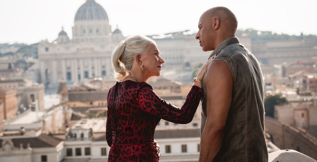 Queen (Helen Mirren) has a heart-to-heart with Dom (Vin Diesel) in Fast X as they stand on a balcony overlooking Rome