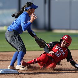 Utah's BreOnna Castaneda slides safe into second base, as BYU's Marissa Chavez tries to make the tag as BYU and Utah play a softball game at BYU in Provo on Wednesday, May 1, 2019. Utah won 11-2.