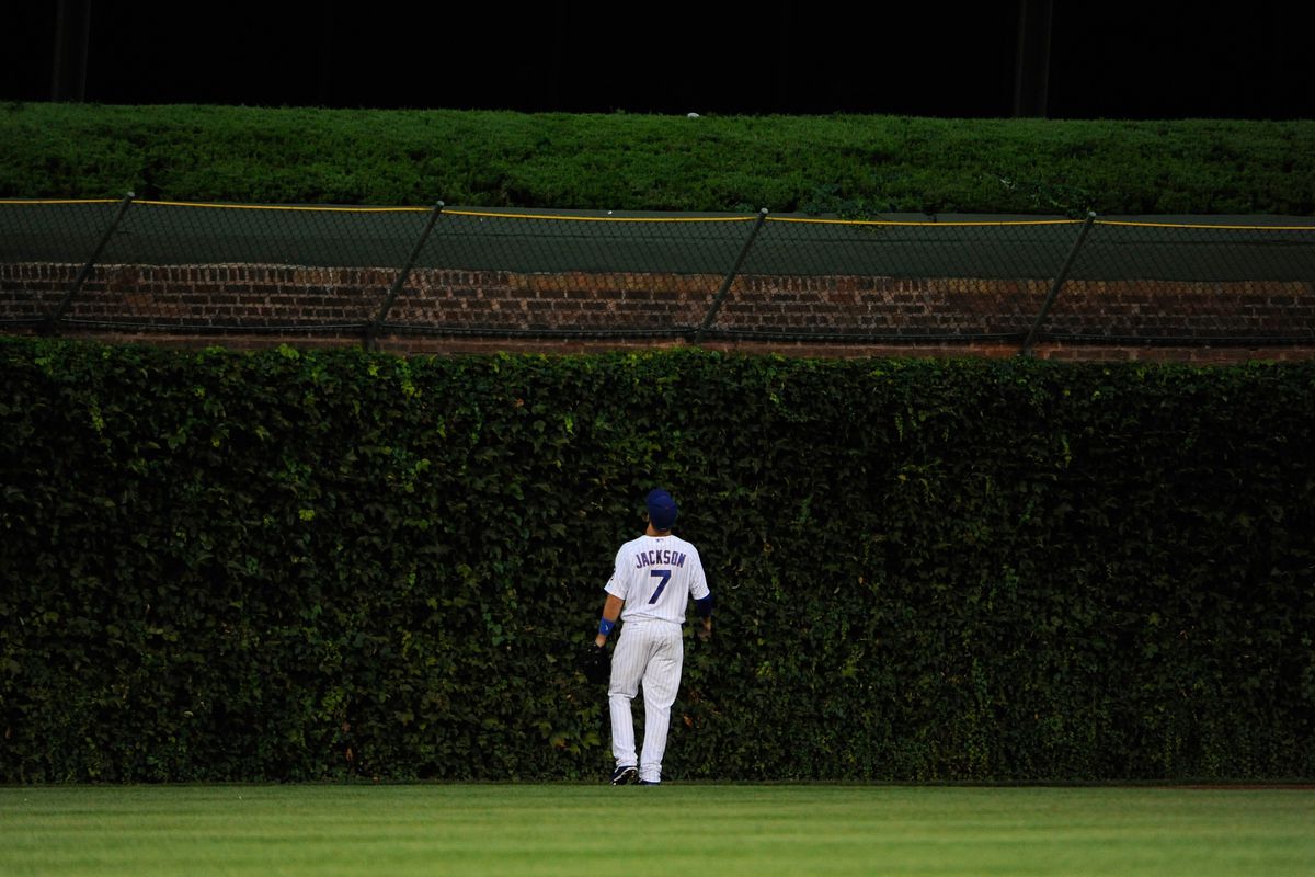The view for many Cubs fielders Tuesday: Brett Jackson of the Chicago Cubs watches a home run off the bat of Brett Wallace of the Houston Astros at Wrigley Field in Chicago, Illinois. (Photo by David Banks/Getty Images)