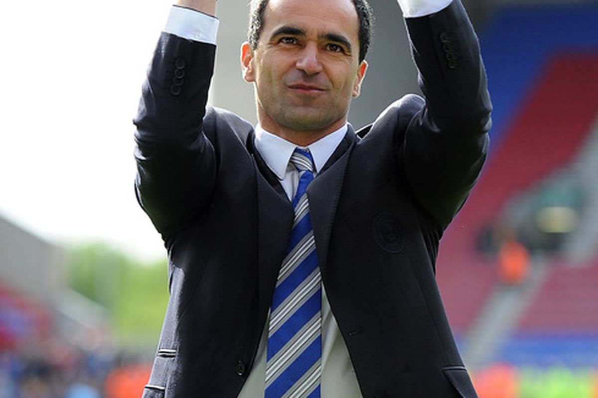 Wigan Athletic manager Roberto Martinez applauds the supporters following the Barclays Premier League match between Wigan Athletic and Wolverhampton Wanderers at DW Stadium.