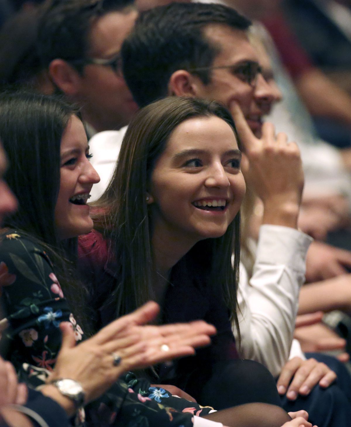 Conferencegoers react to the announcement of 12 new temples during the Sunday afternoon session of the 188th Semiannual General Conference of The Church of Jesus Christ of Latter-day Saints in the Conference Center in downtown Salt Lake City on Sunday, Oc