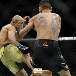 Jose Aldo kicks Max Holloway at UFC 218.
