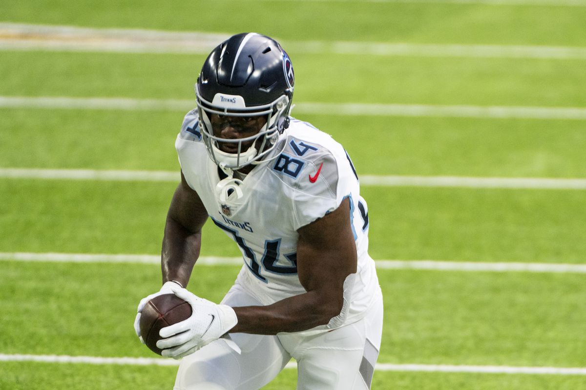 Corey Davis #84 of the Tennessee Titans warms up before the game against the Minnesota Vikings at U.S. Bank Stadium on September 27, 2020 in Minneapolis, Minnesota.