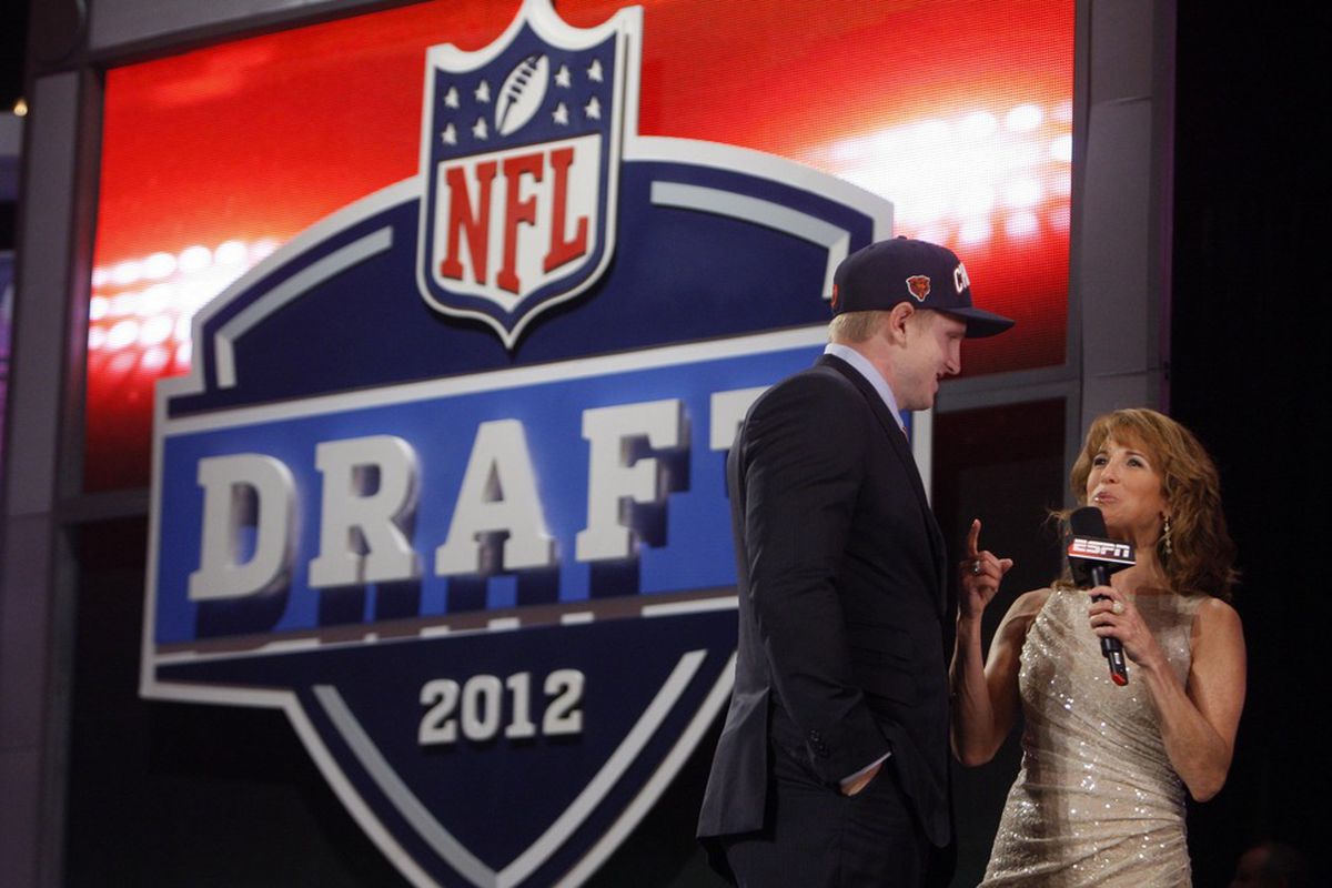 Shea McClellin (Boise State) is interviewed by ESPN reporter Suzy Kolber after being introduced as the number nineteen overall pick to the Chicago Bears. Reports say he did not "pull a Namath."