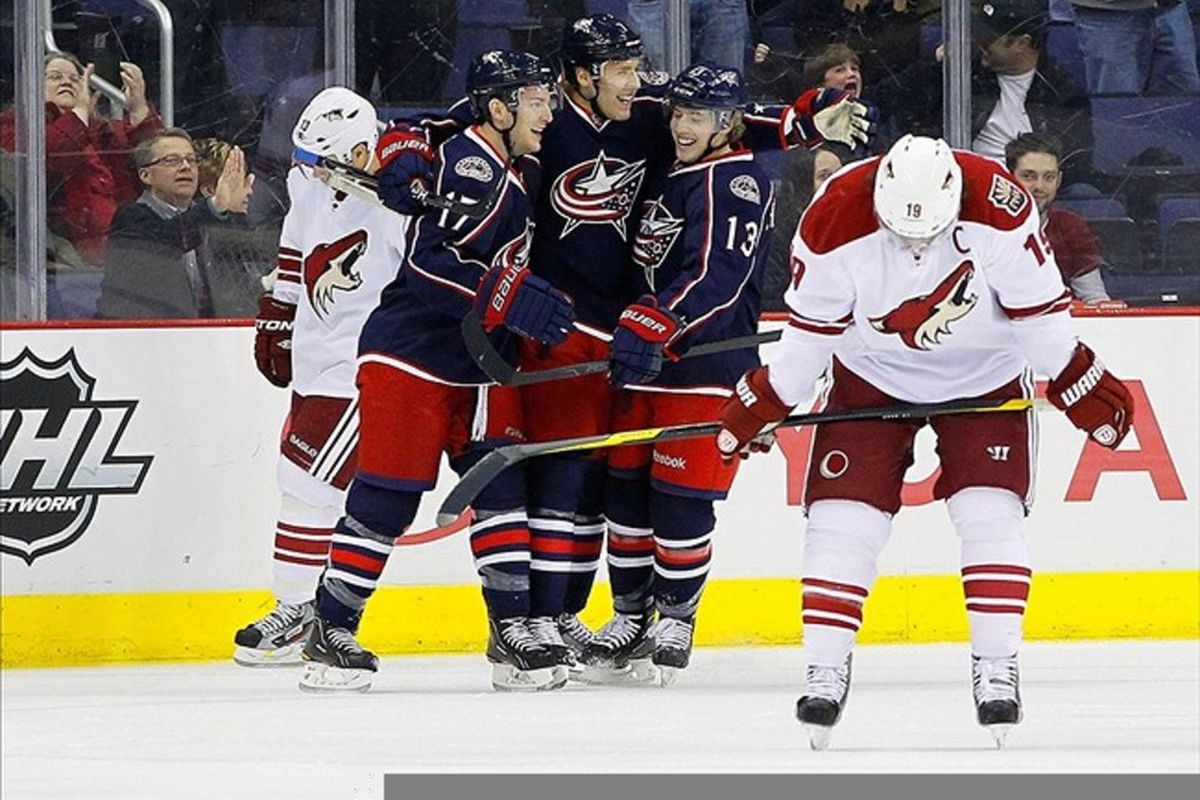 Columbus Blue Jackets defenseman Jack Johnson (7) celebrates a goal against the Phoenix Coyotes during the first period at Nationwide Arena. Mandatory Credit: Russell LaBounty-US PRESSWIRE