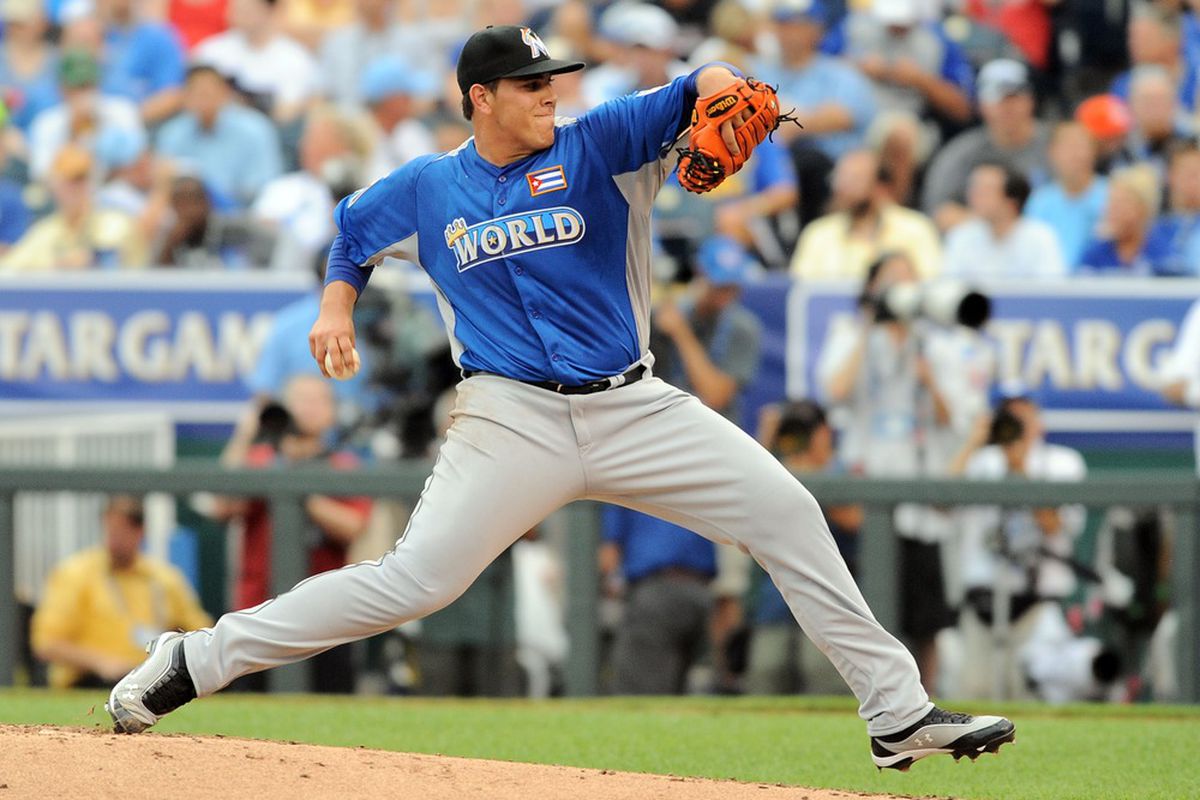 July 8, 2012; Kansas City, MO, USA; World pitcher Jose Fernandez throws a pitch during the second inning of the 2012 All Star Futures Game at Kauffman Stadium.  Mandatory Credit: Denny Medley-US PRESSWIRE