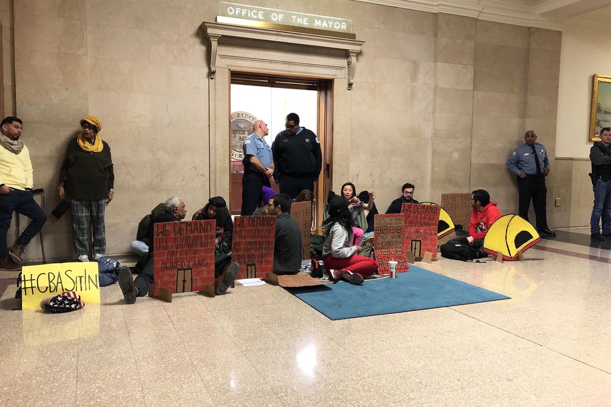 Members of Southside Together Organizing for Power held a sit-in outside Mayor Lori Lightfoot’s office Tuesday.