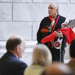 First Nation Representative Lacee Harris explains a blessing as the Salt Lake Interfaith Roundtable held a pipe ceremony and sacred blessing for peace and understanding at the Capitol in Salt Lake City on Wednesday, Feb. 12, 2014. 