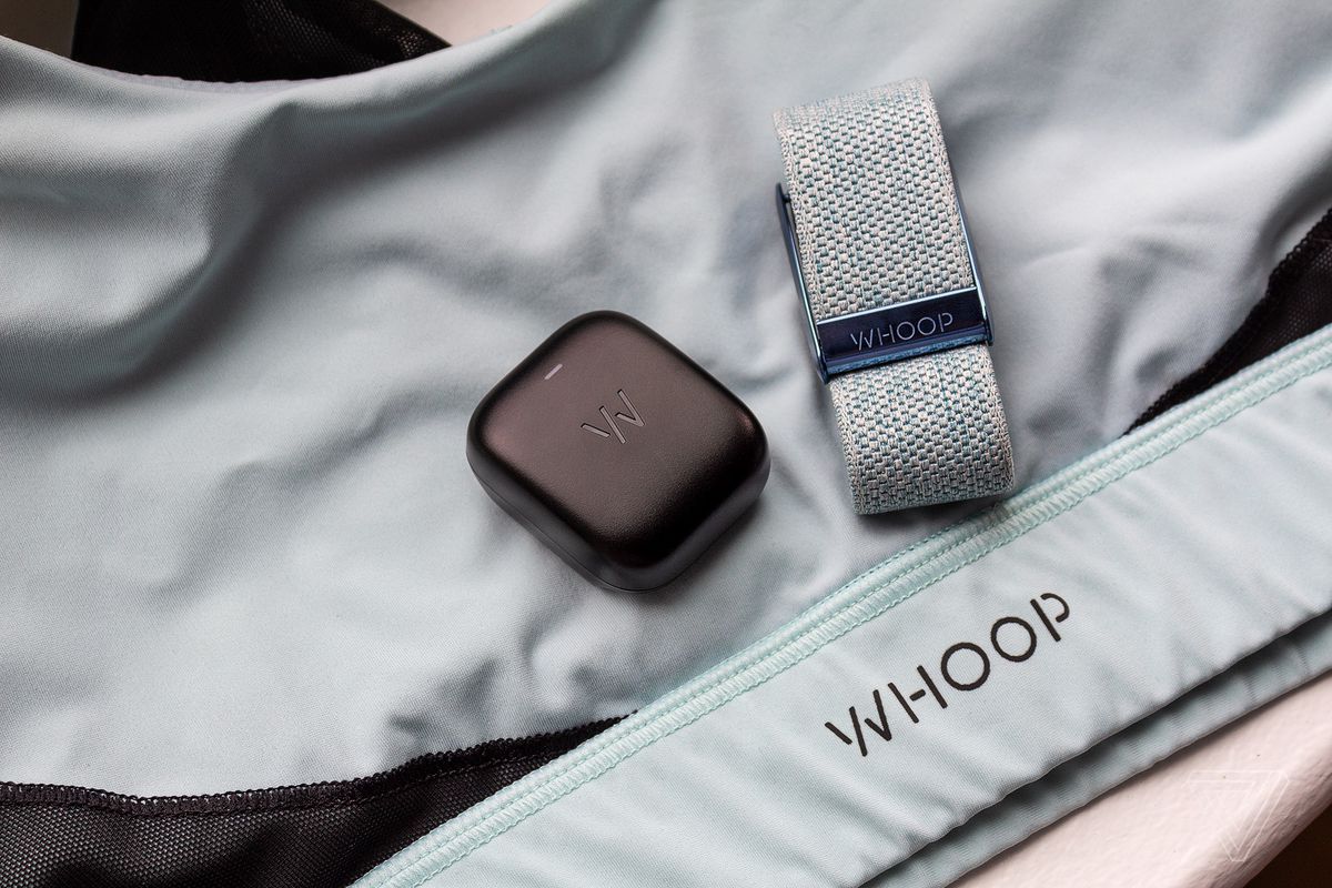 The Whoop 4.0 in a strap, the battery pack, and the sports bra.
