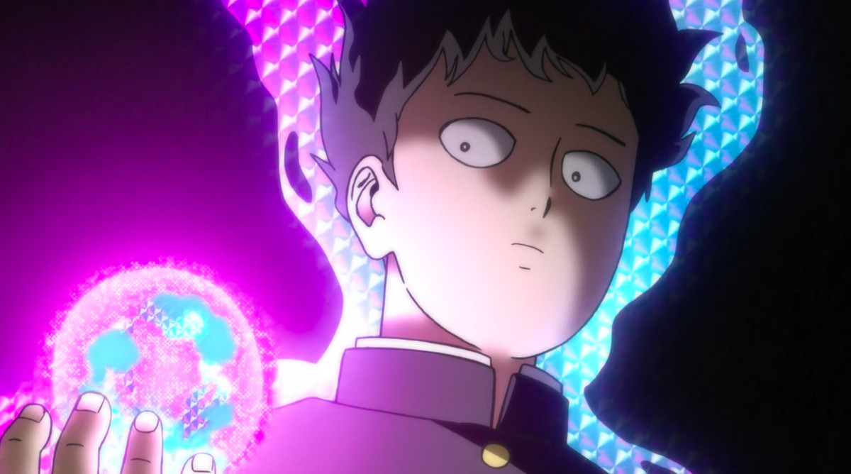 Mob, of Mob Psycho 100, is surrounded by a sparkling aura that signifies his psychic powers. His hair is levitating due to the power, and he cradles a ball of light in his palm. His expression is serious.
