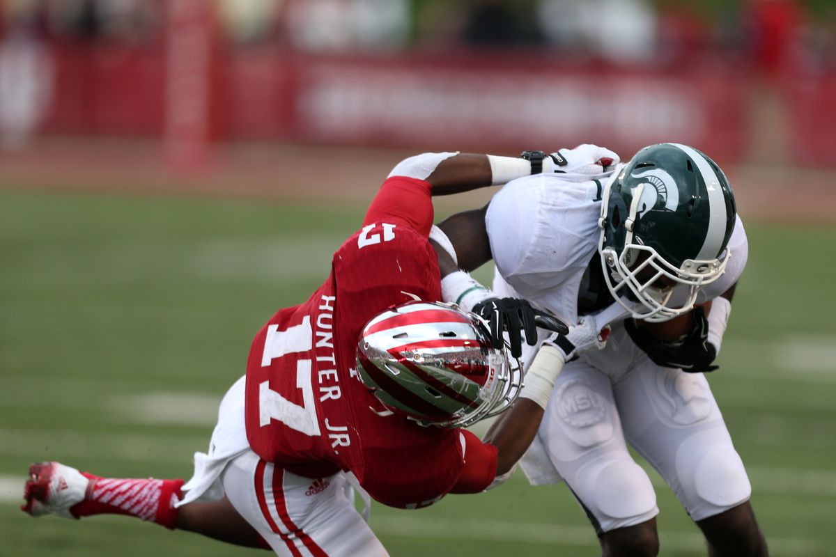 Michael Hunter makes a tackle while playing for Indiana