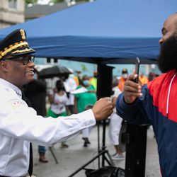 Chicago Police Supt. David Brown greets community activist William Calloway in West Woodlawn, Friday morning, July 10, 2020. Chicago Police Department announced the launch of “Summer Mobile Patrol,” a collaborative, community policing effort among police, other city agencies and community members.