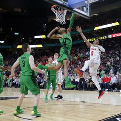 Oregon Ducks forward Kenny Wooten blocks a shot by Utah Utes guard Sedrick Barefield to seal the game for Oregon during the Pac-12 basketball tournament in Las Vegas on Thursday, March 8, 2018.