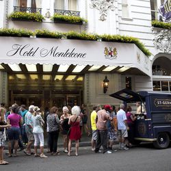 Tales goers hang outside the Hotel Monteleone, where many of the events are sponsored, and receive drinks crafted by St. Germain.