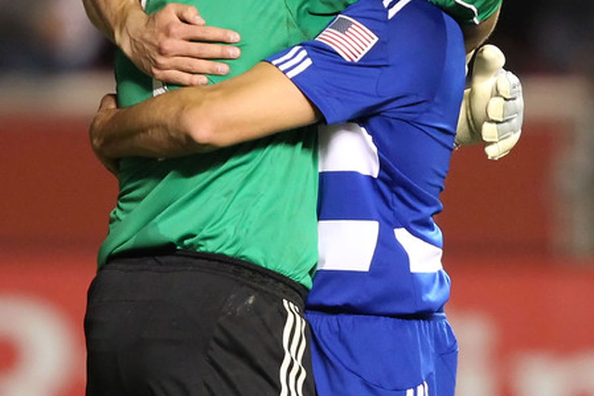 SANDY UT - NOVEMBER 6: Kevin Hartman #1 and George John #14 of FC Dallas celebrate after beating Real Salt Lake at an MLS playoff game November 6 2010 at Rio Tinto Stadium in Sandy Utah.  (Photo by George Frey/Getty Images)