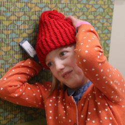 Kaidence Stephenson, who is a heart transplant patient, tries on a red hat at the Eccles Primary Children’s Outpatient Services Building on Monday, Feb. 8, 2016, in Salt Lake City. This week is Congenital Heart Defects Awareness Week, and to mark the occasion, American Heart Association volunteers, Intermountain Healing Hearts and Emily Lewis, Mrs. Utah US Continental, presented the little red hats to the hospital's littlest patients. Every year about 40,000 babies are born in the United States with a congenital heart defect, but thanks to advancements made through research, more infants with such defects survive to adulthood. 