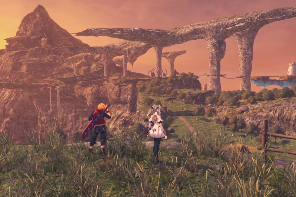 two people looking out at rock formations in Xenoblade Chronicles Definitive Edition