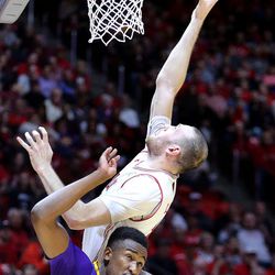 Utah Utes forward David Collette (13) shoots over LSU Tigers forward Aaron Epps (21) during a men's basketball game at the Huntsman Center in Salt Lake City on Monday, March 19, 2018. Utah won 95-71.