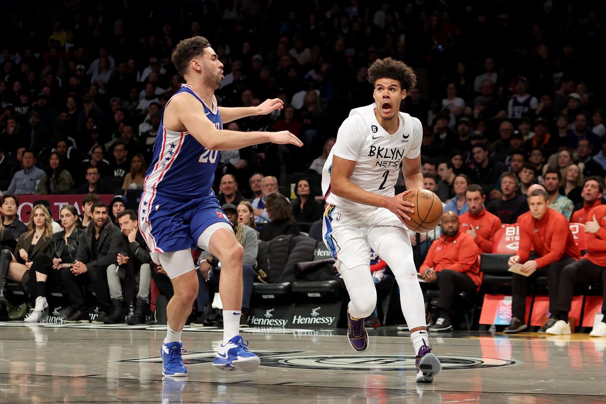 Brooklyn Nets forward Cameron Johnson (2) drives to the basket against Philadelphia 76ers forward Georges Niang (20) during the third quarter at Barclays Center.&nbsp;