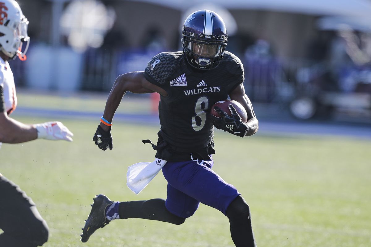 Weber State sophomore Rashid Shaheed runs by a defender. He is one of four Wildcat players to earn STATS FCS preseason All-American honors.