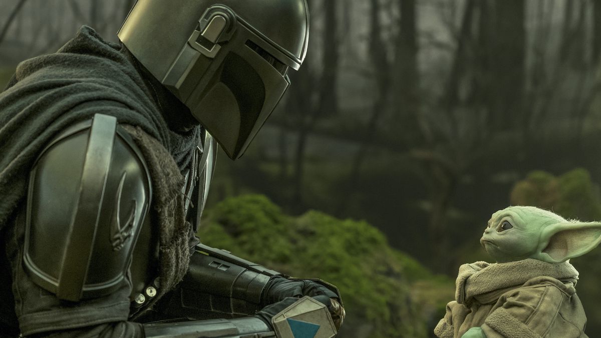 Djin and Grogu watch each other in a forest in Episode 13 of The Mandalorian.