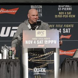 Bisping, White and GSP listen to a question.