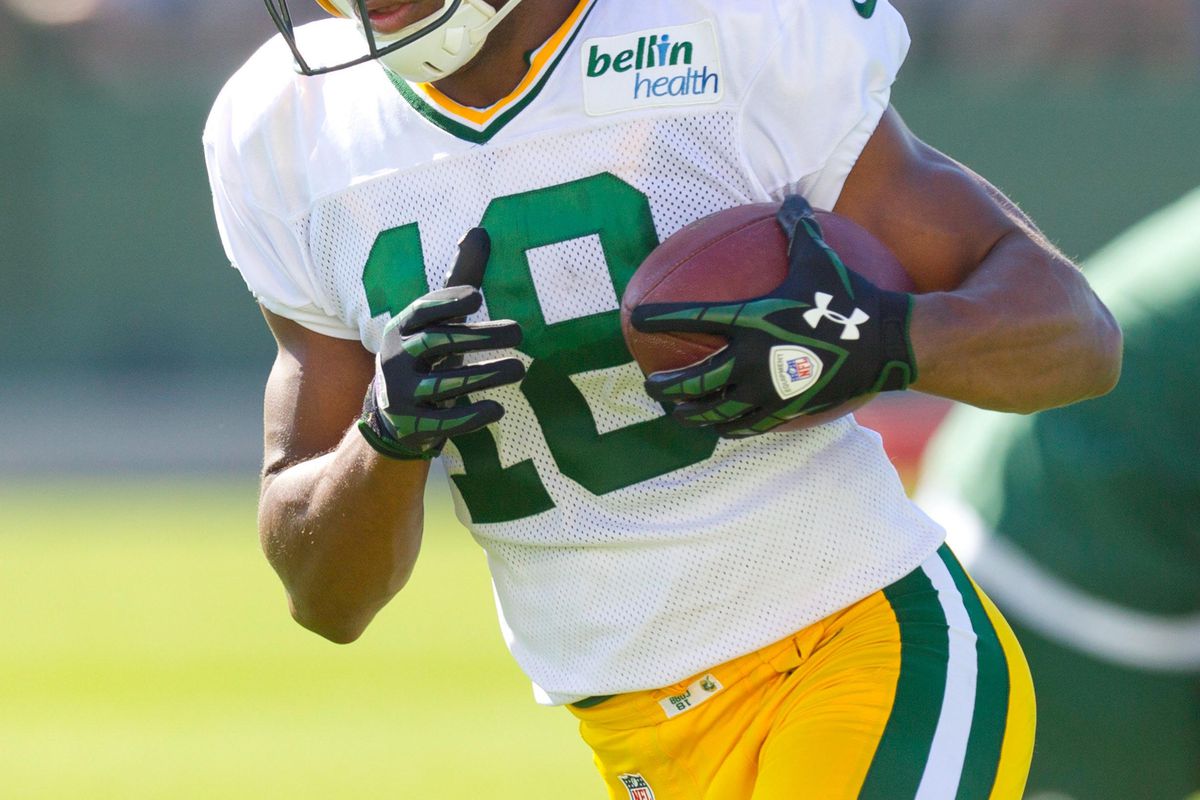 July 28, 2012; Green Bay, WI, USA; Green Bay Packers wide receiver Randall Cobb (18) carries the football during training camp practice at Ray Nitschke Field in Green Bay, WI. Mandatory Credit: Jeff Hanisch-US PRESSWIRE
