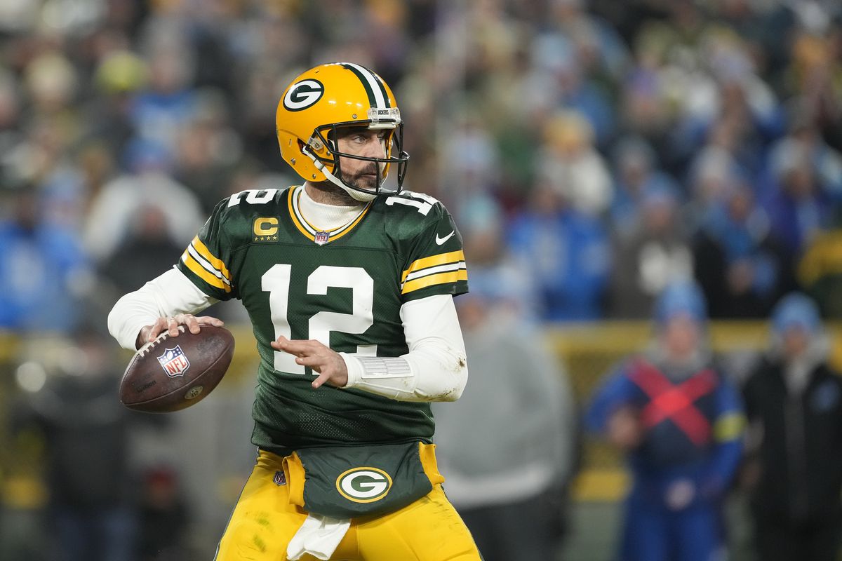 Aaron Rodgers #12 of the Green Bay Packers looks to the throw the pass against the Detroit Lions in the second half at Lambeau Field on January 08, 2023 in Green Bay, Wisconsin.