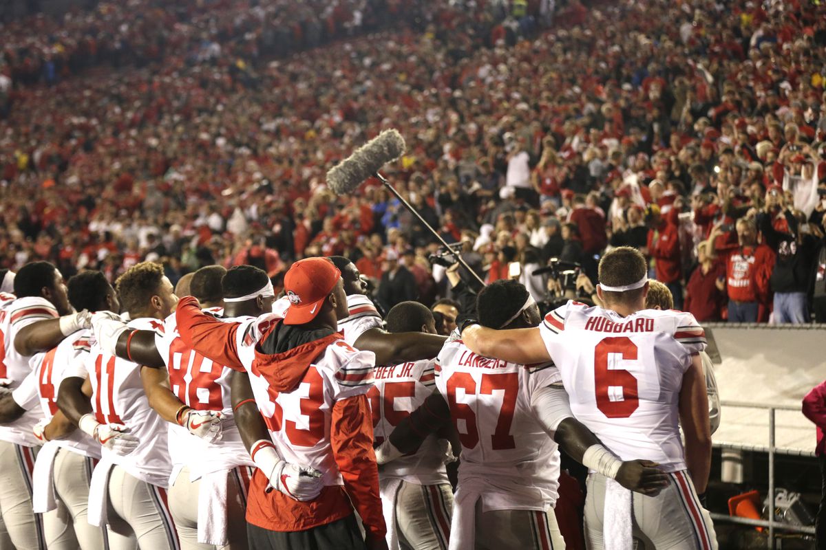 MADISON, WI:  The Ohio State Buckeyes celebrate after the win over the Wisconsin Badgers at Camp Randall Stadium.