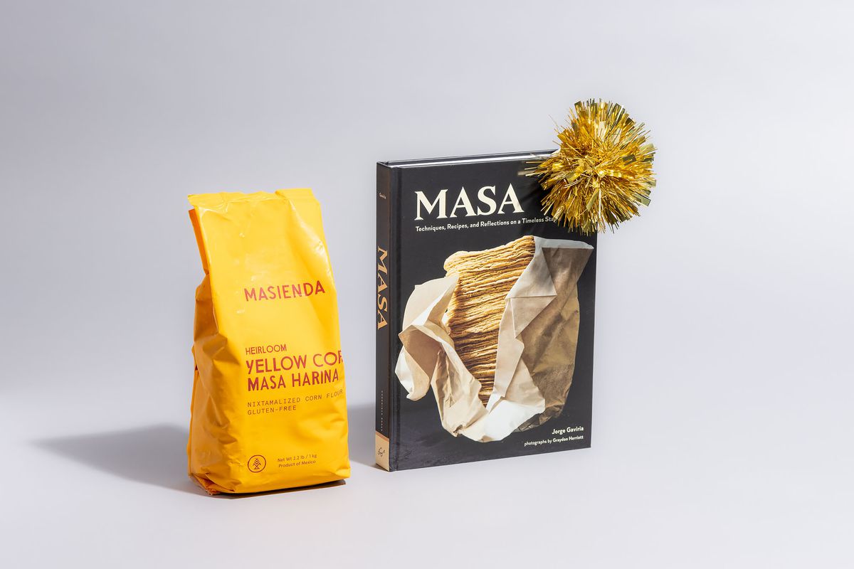 The Masa cookbook and a yellow bag of heirloom masa from Masienda.