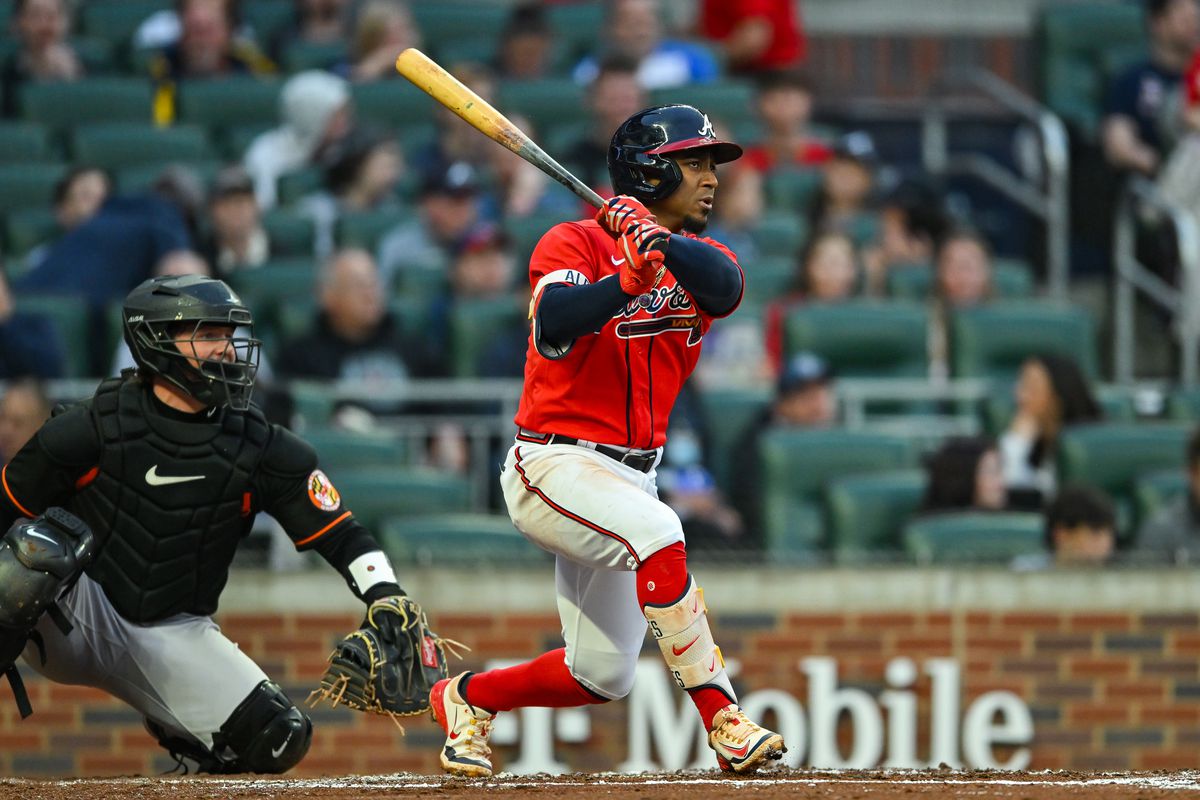 Atlanta second baseman Ozzie Albies hits a line drive during the MLB game between the Baltimore Orioles and the Atlanta Braves on May 5th, 2023 at Truist Park in Atlanta, GA.