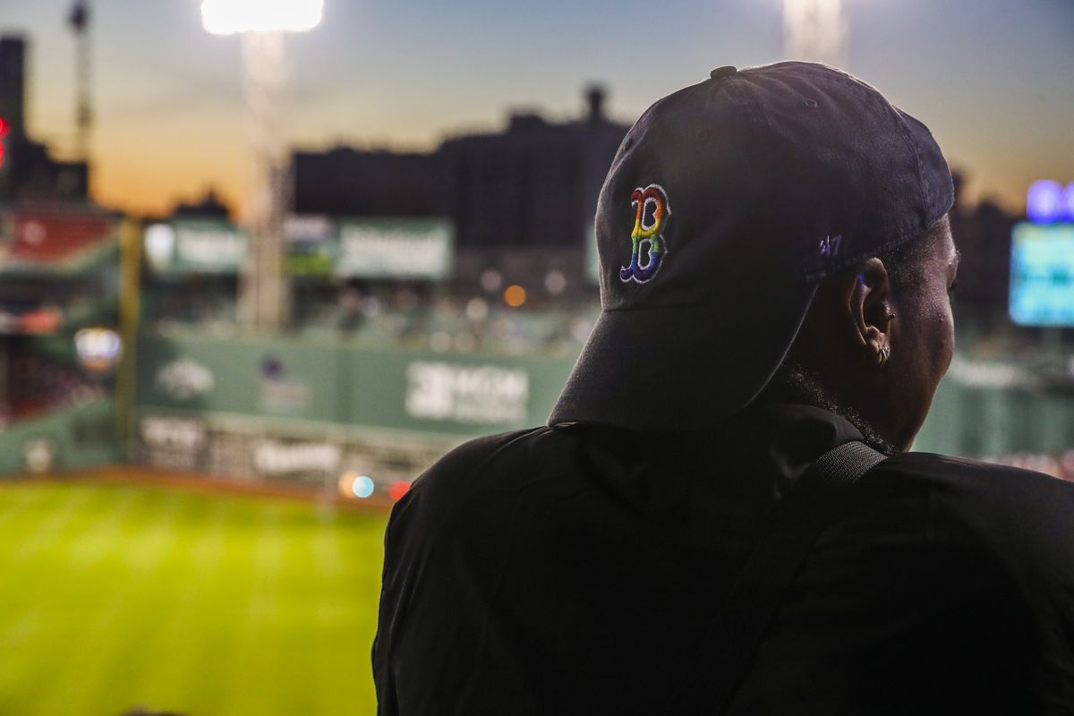 A fan wears a Red Sox Pride cap at Fenway Park in 2021.