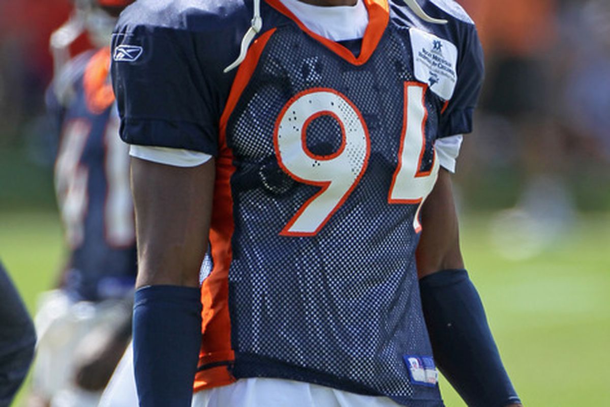 ENGLEWOOD CO -  Linebacker Jarvis Moss #94 of the Denver Bronocs takes part in practice during training camp at Dove Valley.  (Photo by Doug Pensinger/Getty Images)