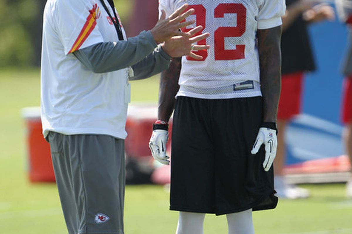 SAINT JOSEPH, MO - JULY 31:  Head coach Todd Haley talks with receiver Dwayne Bowe #82 during Kansas City Chiefs Training Camp on July 31, 2011 in Saint Joseph, Missouri.  (Photo by Jamie Squire/Getty Images)