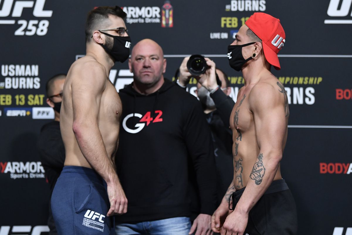 In this handout provided by UFC, Opponents Julian Marquez and Maki Pitolo face off during the UFC weigh-in at UFC APEX on February 12, 2021 in Las Vegas, Nevada.