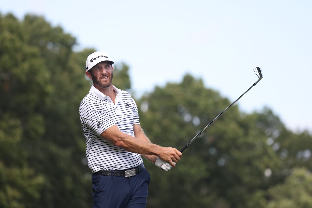 Dustin Johnson of the United States plays a second shot on the 12th hole during the second round of The Northern Trust at TPC Boston on August 21, 2020 in Norton, Massachusetts.