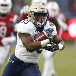 Navy fullback Chris High (33) runs against Louisiana Tech during first half of the Armed Forces Bowl NCAA college football game, Friday, Dec. 23, 2016, in Fort Worth, Texas. (AP Photo/Jim Cowsert)
